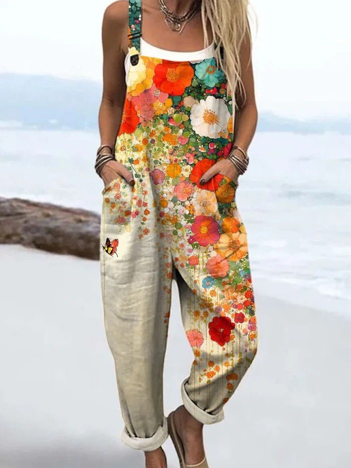 Helena | Ärmelloser Floral-Jumpsuit mit Latz-Stil, Weitem Bein und Seitentaschen